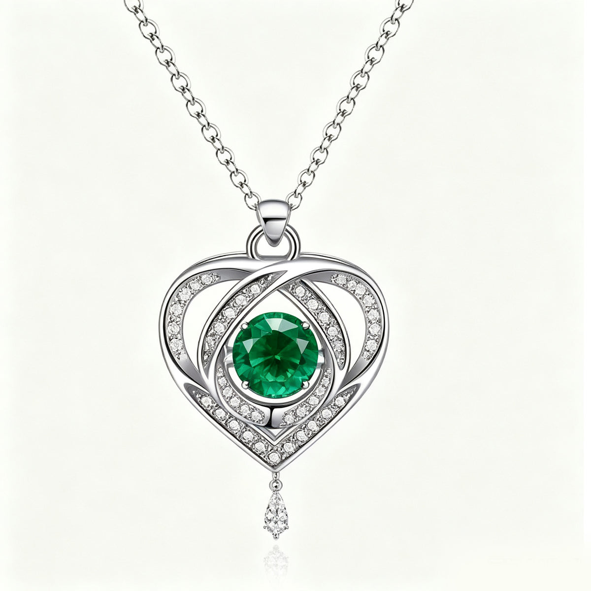 Emerald Radiance Interlocking Heart Pendant Necklace